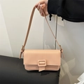 Pink lychee grain leather underarm baguette bag with adjustable strap and flap buckle - Pink