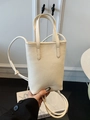 Sac seau blanc crème en cuir à motif litchi avec poignées et bandoulière - Sans Pendentif / Blanc