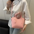 Pink lychee grain leather bucket bag for women with top handles and adjustable shoulder strap - Pink