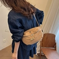 Minimalist khaki crossbody bag in lightweight nylon with a functional dual-zipper design - Khaki