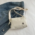 Minimalist cream white nylon crossbody bag with adjustable strap for daily commute - White
