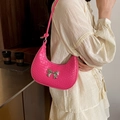 Hot pink crescent underarm bag with crocodile pattern and silver bow detail - Rose Pink