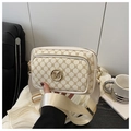 Detail of vintage beige monogram crossbody bag with metallic logo and fabric strap - Off White