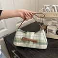 Elegante borsa baguette a quadri verdi con fiocco marrone e manico in pelle sottile - Verde
