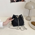Elegant black crocodile texture bucket bag with silver butterfly buckle and pearl charm - Black