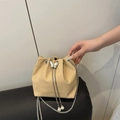 Beige crocodile embossed bucket bag with silver butterfly and pearl chain strap - Khaki