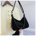 Detail of black crescent hobo bag with pleated texture and golden chain strap - Black