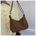 Detail of dark brown crescent shoulder bag featuring glossy embossed leather and metal chain - Coffee