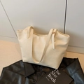 Retro cream large capacity tote bag with adjustable shoulder strap on lifestyle background - Beige
