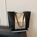 Three-tone minimalist leather tote bag in black, white, and grey with gold buckle - Gray
