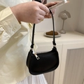 Minimalist black faux leather underarm bag with litchi texture and gold hardware - Black