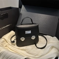 Borsa a secchiello vintage in pelle nera con chiusure a scatto in argento e manico - Nero