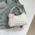 Mini white quilted bubble shoulder bag with pink knot handle and floral pendant charm - White and Pink
