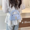 Light blue semi-circular handle crossbody bag with gold buckle in leather texture - Blue