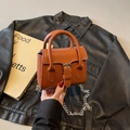 Mini caramel leather crossbody bag with silver buckle and detachable chain strap - Brown