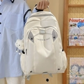 Cream white waterproof nylon backpack with grey drawstring detail and plush cloud charm - With Cloud Charm / White