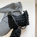 Minimalist black tote bag with 3D bubble texture and sleek leather handle for women - Black