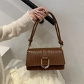 Brown woven shoulder bag with golden U-shaped buckle and elegant rope straps - Tan