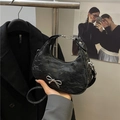 Black crescent bag with pleated texture and silver bow accent for women - Black