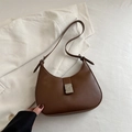 Minimalist dark brown half-moon underarm bag with matte leather and silver buckle - Brown