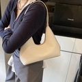 Vintage beige woven dumpling shoulder bag for women with minimalist zipper closure - Khaki