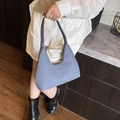 Blue woven hobo bag for women with minimalist half-moon design and silver zipper detail - Blue