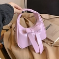 Sac hobo rose verni avec grand nœud élégant et bandoulière en chaîne argentée - Rose