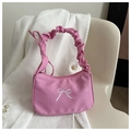 Detail of pink underarm bag with white bow embroidery and ruffled cloud strap design - Rose Pink