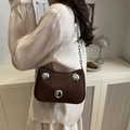 Dark brown crescent shoulder bag with three large silver metallic spheres and chain strap - Brown