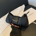 Chic black crescent underarm bag with silver moon hardware and matte leather finish - Black
