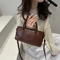 Brown minimalist tote bag with top handles and adjustable shoulder strap in leather-like finish - Dark Brown