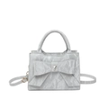 Light gray fashion handbag with a large bow and heart rhinestone on a textured finish - Silver