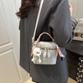 Silver mini bucket bag with silk scarf handle and plush monster charm in metallic finish - Silver With White Long-Legged Pendant