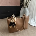 Brown faux leather tote bag with elegant silk scarf detail and golden hardware buckle - Tan
