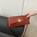 Deep wine red oil wax leather rectangular shoulder bag with vintage gold metal buckle - Red
