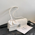 Cream shoulder bag with silk scarf and snake-shaped strap featuring a crystal buckle - White