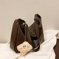 Detail of vintage dark brown tote bag featuring a plush smiley face pendant and hobo style - Coffee (With Pendant)