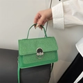 Green leather patchwork crossbody bag with silver buckle and top handle for women - Green