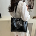 Black glossy PU leather tote bag with silver bow and chain strap for daily commute - Black