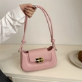 Lichtroze geplooide crossbodytas met gouden gesp en een stijlvolle geknoopte schouderriem - Roze