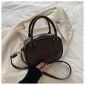 Close-up of lucky OHIO embossed lettering on retro dark brown faux leather handbag - Dark Coffee
