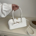 Chic white PU leather bowling bag with gold hardware and versatile crossbody strap - White
