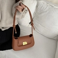 Caramel brown minimalist baguette bag with golden square buckle and knotted strap detailing - Tan