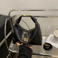 Modern black glossy leather hobo bag with gold metal logo and versatile shoulder strap - Black without Pendant