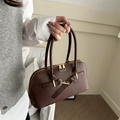 Retro dark brown leather boston bag with gold horsebit detail and top handles - Brown
