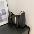 Minimalist black hobo shoulder bag with matte leather finish and gold chain detail - Black