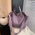 Minimalist purple nylon tote bag with wide strap on knitted background - Purple