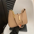 Elegant beige crescent shoulder bag with gold chain strap and sleek metal buckle - Khaki