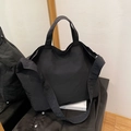 Minimalist large black nylon tote bag with dual straps for versatile carrying options - Black