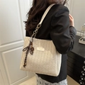 Chic cream straw tote bag with white leather straps and golden chain accents - White With Rope Pendant